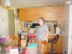 Amy in
     dining room (kitchen behind)